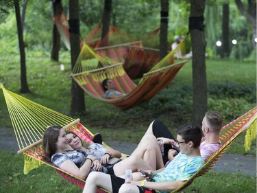 People enjoy the hammocks  Day 1 of the Osheaga festival in Montreal, August 3, 2018.
