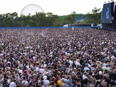 Thousands endured the sun and heat at Osheaga in Montreal, Sunday August 5, 2018.