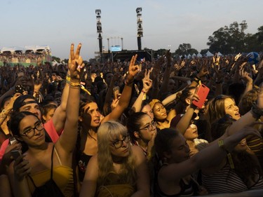 Crowd cheers on  Post Malone as he performs at Osheaga in Montreal, Sunday, August 5, 2018.