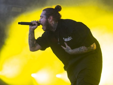 Post Malone performs at Osheaga in Montreal, Sunday, August 5, 2018.