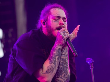 Post Malone performs at Osheaga in Montreal, Sunday, August 5, 2018.