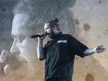 Post Malone performs at Osheaga in Montreal, Sunday, August 5, 2018.