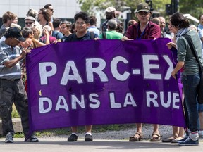 Community groups protest the conversion of  Hutchison Plaza in Parc-Extension on Thursday August 9, 2018.