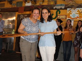 Being at Camp YMCA Kanawana “fostered an independent spirit in me," says Pip Award recipient Marina Sharpe, right, with previous winner Jeniene Philips Birks at the camp on Aug. 2.