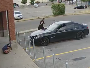 Laval police video shows a man fleeing the scene after punching a victim.