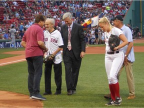 Roland Hemond (second from left) is honoured before the Aug. 2 Boston Red Sox home game. He is flanked by Tony La Russa and Dave Dombrowski.
