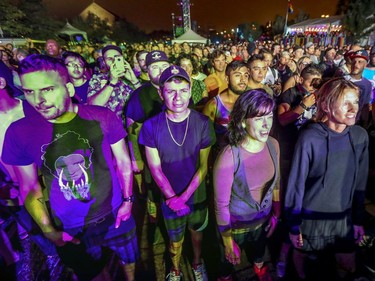 Music fans listen to Fischerspooner on the main stage during Pride festivities in Montreal on Friday, August 17, 2018.