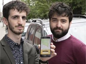 Dardan Isufi and Raphaël Gaudreault are seen with their phone app on Wednesday, Aug. 22, 2018.