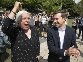 Québec Solidaire party spokesperson Manon Massé pumps her fist next to Gabriel Nadeau-Dubois on Thursday, August 23, 2018, the first day of the provincial election campaign. (Pierre Obendrauf / MONTREAL GAZETTE)