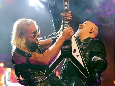 Judas Priest singer Rob Halford and guitarist Richie Faulkner during concert in Montreal Wednesday August 29, 2018.