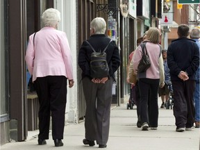 Senior citizens make their way down a street in Peterborough, Ont. on Monday May 7, 2012. Statistics Canada says the country's population now features more seniors than children.