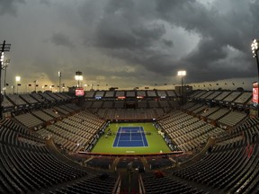 A thunderstorm causes a game stoppage on centre court during day one of the Rogers Cup at IGA Stadium on August 6, 2018 in Montreal.