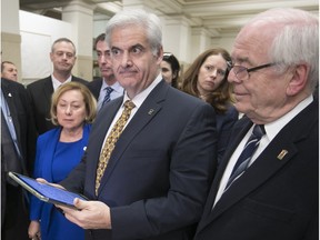 The tone Thursday was much more positive than here in January 2018, when Montreal West Mayor Beny Masella (centre) and other mayors spoke after Montreal Mayor Valérie Plante's first budget.