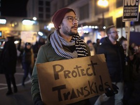 CHICAGO, IL - MARCH 03: Demonstrators protest for transgender rights with a rally, march through the Loop and a candlelight vigil to remember transgender friends lost to murder and suicide on March 3, 2017 in Chicago, Illinois. The demonstration was sparked by President Donald Trumps recent decision to reverse the Obama-era policy requiring public schools to allow transgender students to use the bathroom that corresponds with their gender identity.