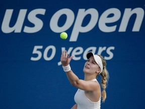 Eugenie Bouchard of Canada serves to Marketa Vondrousova of the Czech Republic during their 2018 U.S. Open women's round 2 match on August 30, 2018 in New York.