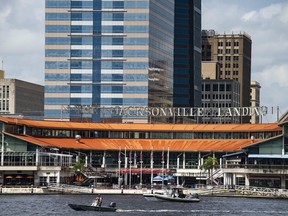 The Coast Guard patrols the St. Johns River outside The Jacksonville Landing in Jacksonville, Fla., Sunday, Aug. 26, 2018. Florida authorities are reporting multiple fatalities after a mass shooting at the riverfront mall that was hosting a video game tournament.