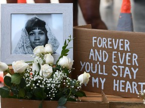 Flowers and tributes are placed on the Star for Aretha Franklin on the Hollywood Walk of Fame in Hollywood, California after the music icon, legendary singer and "Queen of Soul" loved by millions whose history-making career spanned six decades, died on Thursday, Aug. 16, 2018.