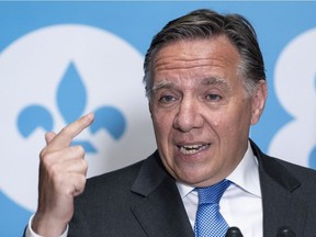 Coalition Avenir Quebec leader Francois Legault responds to a question during a news conference in Longueuil, Que. on Tuesday, July 31, 2018.