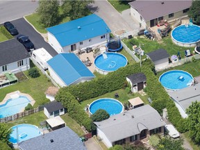 Suburban homes with swimming pools near Beloeil on the South Shore of Montreal.