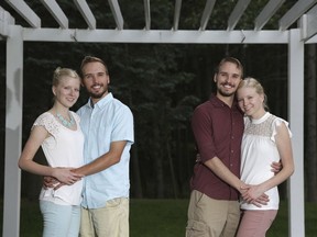 From left, Krissie Bevier and fianc, Zack Lewan and Nicholas Lewan and fianc, Kassie Bevier, pose for a photo, Sunday, July 29, 2018, in Grass Lake. Identical twins Krissie and Kassie Bevier are marrying identical twins, Zack and Nicholas Lewan. (Nikos Frazier /Jackson Citizen Patriot via AP) ORG XMIT: MIJAC104