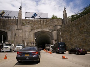 FILE - In this June 21, 2018, file photo, traffic on Route 495 enters the Lincoln Tunnel en route to New York City, in Weehauken, N.J. Monday, Aug. 20 marks the first full weekday of lane closures on the approach to the Lincoln Tunnel, part of a 2 1/2-year project that will rebuild an aging bridge and roadway - and cause severe congestion in an area that already is one of the northeastern U.S's worst bottlenecks.