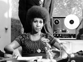 In this March 26, 1973, file photo, soul singer Aretha Franklin appears at a news conference. Even then you could see the judgment in her eyes.