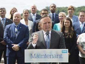Coalition Avenir Québec Leader François Legault speaks to reporters at a news conference to launch his election campaign on Aug. 23, 2018, in Quebec City.