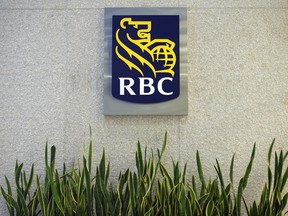 Signage is displayed inside the Royal Bank of Canada (RBC) headquarters building during the company's annual general meeting in Toronto, Ontario, Canada, on Thursday, April 6, 2017. RBC Chief Executive Officer David urged lawmakers to coordinate interventions and act quickly to cool housing markets, particularly in Toronto and Vancouver. Photographer: Cole Burston/Bloomberg