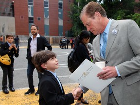 Headmaster Hal Hannaford greets one of the Grade 3 students on the first day of the 2017-18 school year at Selwyn House.
