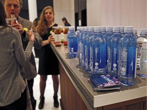 In this March 8, 2017 photo, bottles of water and flavored tea are displayed during The Shine, an alcohol-free social social event at a chic hotel in the Williamsburg neighborhood in the Brooklyn borough of New York. These events, which are popping up in New York, Los Angeles and Chicago, are part of a trend fueled by millennials seeking to find meaningful connections while they party,