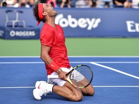 Rafael Nadal of Spain celebrates after defeating Stefanos Tsitsipas of Greece during championships men's finals Rogers Cup tennis action in Toronto on Sunday, Aug. 12, 2018.