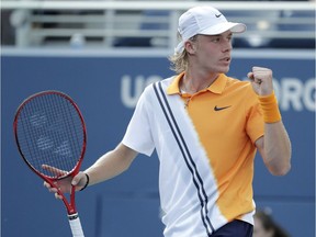 Denis Shapovalov, of Canada, reacts after a point against Félix Auger-Aliassime, also of Canada, during their first round match at the U.S. Open tennis tournament, Monday, Aug. 27, 2018, in New York.