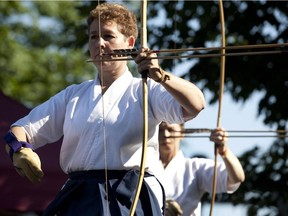 France Verville of dojo Suiko  readies herself to release an arrow in the tradition of Zen Archery   at the seventh annual Matsuri Japon, a festival featuring Japanese culture, both traditional and new at the old port in Montreal, Sunday August 01, 2009.