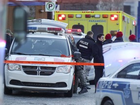 Police at the scene where Jimmy Cloutier, 38, was shot and ultimately killed by an officer near the Old Brewery Mission in 2017.