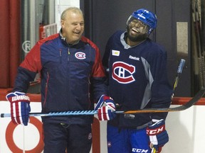 Coach Michel Therrien and defenceman P.K. Subban share a a laugh during practice at the Bell Sports Complex in Brossard on Feb. 23, 2016.