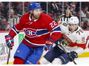 Montreal Canadiens defenceman Karl Alzner skates away from Florida Panthers Maxim Mamin during second period in Montreal on March 19, 2018.