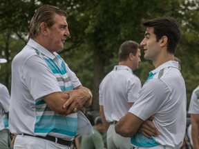 Canadiens' Max Pacioretty chatted with former Habs great Serge Savard during the captain's charity golf tournament n Ste-Julie in August.