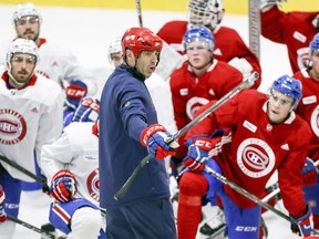 "I’m invested in practice and I’m talking in drills. It’s just something that I don’t feel I could coach comfortably on the ice without a helmet," says Laval Rocket head coach Joel Bouchard, running practice during Montreal Canadiens rookie camp at the Bell Sports Complex in Brossard on Thursday, Sept. 6, 2018.