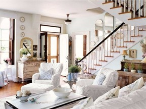 Natural elements such as wood help keep an all-white room feeling warm and cosy.