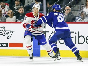 Canadiens' Jesperi Kotkaniemi avoids a check by Toronto Maple Leafs' Mac Hollowell at the Rookie Challenge game in Laval on Sept. 9, 2018.