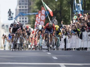 Michael Matthews, far left, overtook Italian Sonny Colbrelli in the final 20 metres to win the Grand Prix Cycliste de Montréal.