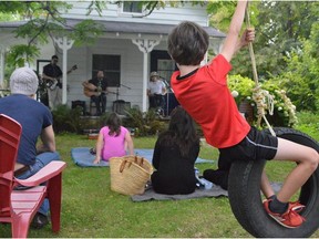 Jill Chard's son Rohan enjoys a Porchfest performance last year.