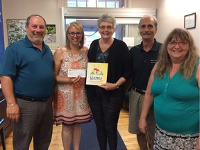Joey Savattiere (left) and fellow Becket Players board members recently presented a $15,000 cheque to WIAIH's executive director Lyne Charlebois (second from left) for the Kizmet project. The funds were raised through two breakfast fundraisers and this spring’s Becket show. The Becket Players will be holding another fundraising breakfast on Sept. 26, from 6 a.m. to 3 p.m., at Déjeuner Inc., 4720 St-Jean Blvd in Pierrefonds.