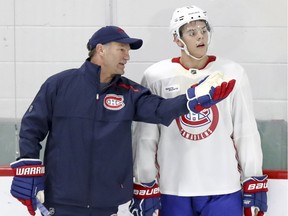 Canadiens associate coach Kirk Muller gives instructions to Jesperi Kotkaniemi, the team’s first-round pick at the 2018 NHL Draft, during training-camp practice on Sept. 14, 2018 at the Bell Sports Complex in Brossard.