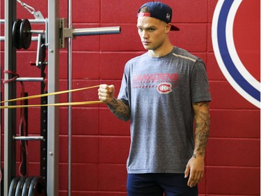 Newly-acquired Montreal Canadien Max Domi does exercises with an elastic band during fitness testing on the first day of training camp at the Bell Sports Complex in Brossard on Thursday, Sept. 13, 2018.