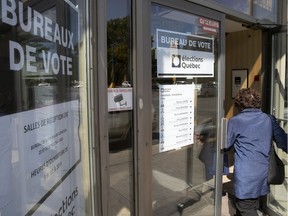 A voter arrives at an advance polling station on Bélanger St. on Sept. 23.