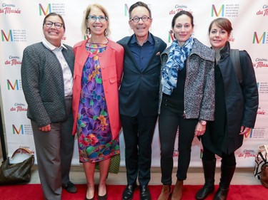 Michel de la Cheneliere, vice-chairman of the board of trustees of the Montreal Museum of Fine Arts, is flanked by board members Lise Croteau, left, Sari Hornstein, Michaela Sheaf and Stephanie Marchand at the opening of the Cinéma du Musée in Montreal Tuesday, Sept. 25, 2018.