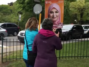 A Montreal man has filed a complaint with Élections Québec after he witnessed two women vandalizing campaign signs for a Muslim candidate running in Outremont.