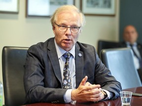 Jean-François Lisée (pictured in a meeting with the Montreal Gazette's editorial board on Sept. 21) says Quebecers with special needs often wind up in a “black hole” after they turn 21.