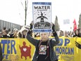 (FILES) In this file photo taken on March 10, 2018, Harriet Prince, 76, of the Anishinaabe tribe marches with Coast Salish Water Protectors and others against the expansion of Texas-based Kinder Morgan's Trans Mountain pipeline project, in Burnaby, British Columbia, Canada. - The Canadian Federal Court of Appeal on August 30, 2018, quashed the government's approval of the Trans Mountain pipeline to the Pacific, siding with indigenous people worried about increased tanker traffic harming whales along the coast.